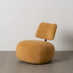 Sillón moderno de respaldo bajo disponible en 5 tonalidades, perfecto para espacios contemporáneos.