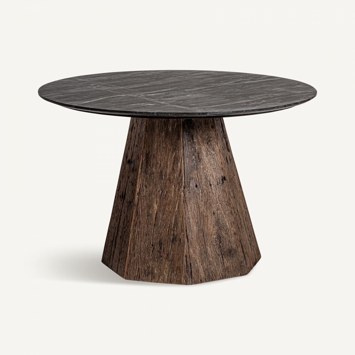 Mesa redonda exclusiva con una elegante base monopata en madera oscura, diseño sofisticado de la colección premium de Vical Home. Perfecta para añadir estilo y calidez a tu comedor.